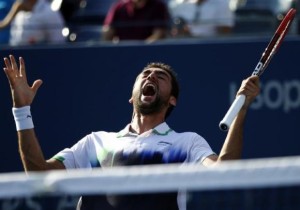 Marin Cilic of Croatia celebrates his win over Tomas Berdych of the Czech Republic during their quarter--final match at the 2014 U.S. Open tennis tournament in New York